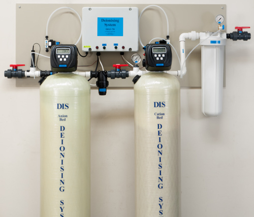 Deionising water treatment system